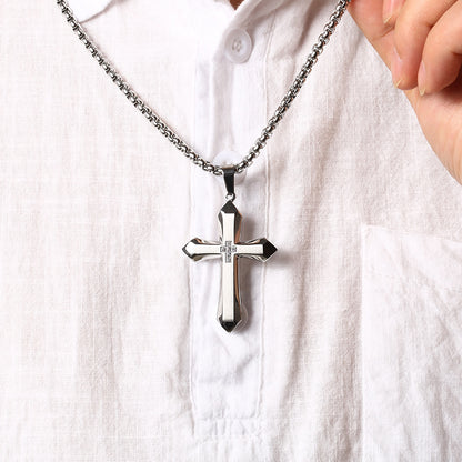 Black Faceted Cross Necklace worn on shirt — Cross of Grace