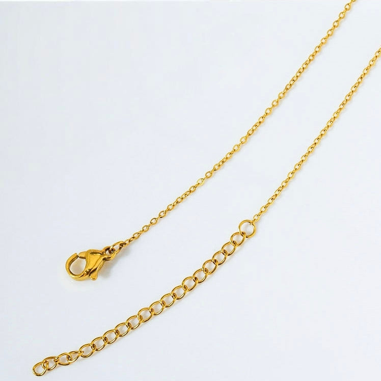 Gold chain extender detail of Zircon Clover Flower Necklace — Cross of Grace