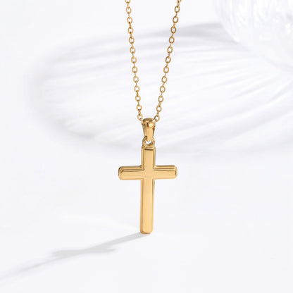Men's gold classic cross necklace lifestyle flat lay