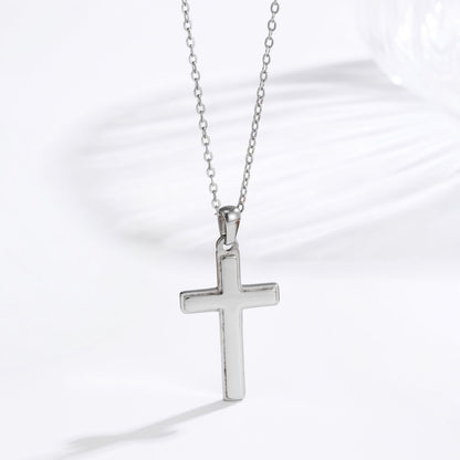 Men's steel silver classic cross necklace lifestyle flat lay