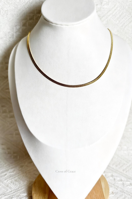 Gold Herringbone Chain Necklace on display bust — Cross of Grace
