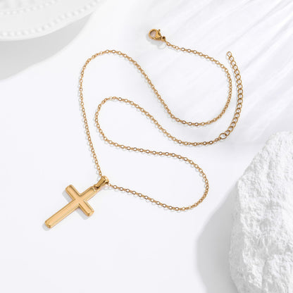 Men's gold classic cross necklace lifestyle flat lay